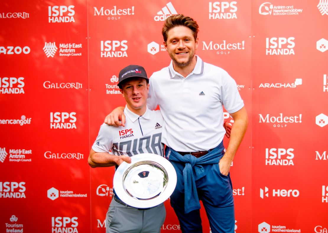Lawlor poses with the World Disability Invitational trophy alongside Niall Horan.