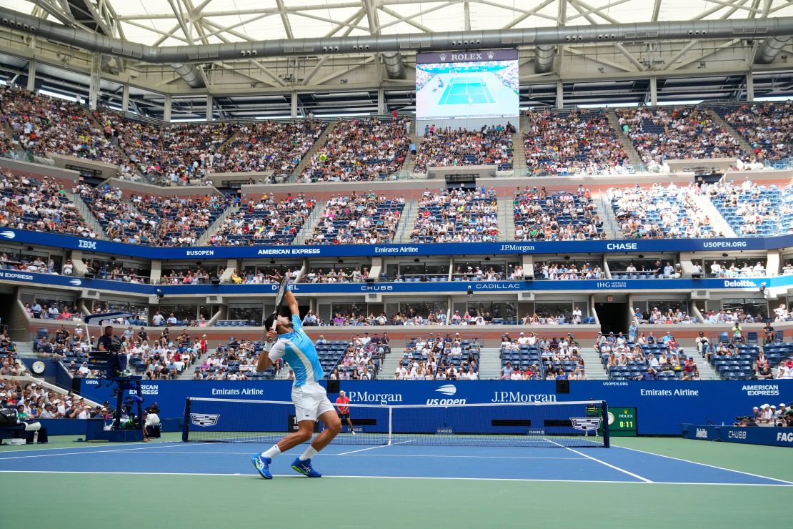 Novak Djokovic defeats Taylor Fritz, an American tennis player, to advance to the semifinals of the US Open. He celebrates by singing along with the crowd.