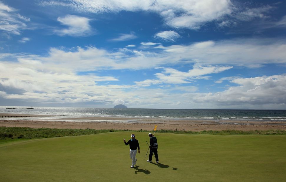 <strong>Turnberry: </strong>The Ailsa course occupies a sublime location overlooking the Firth of Clyde with sweeping views to the Ailsa Craig rock and the Isle of Arran. 