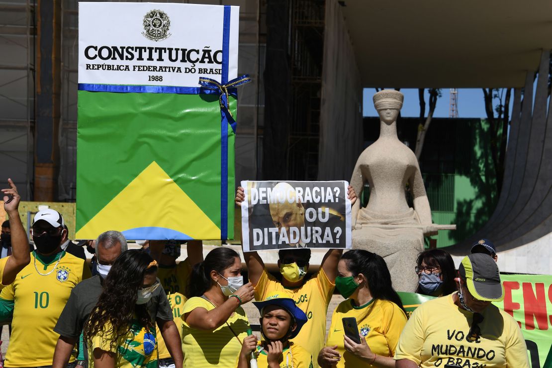 Supporters of Brazilian President Jair Bolsonaro demonstrate to show their support, in Brasilia, on May 31, 2020 during the COVID-19 novel coronavirus pandemic.