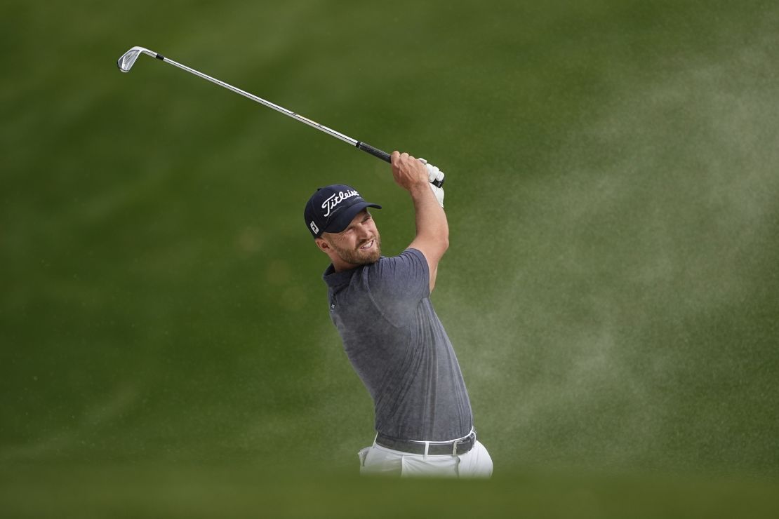 Clark escapes a bunker during the final round.