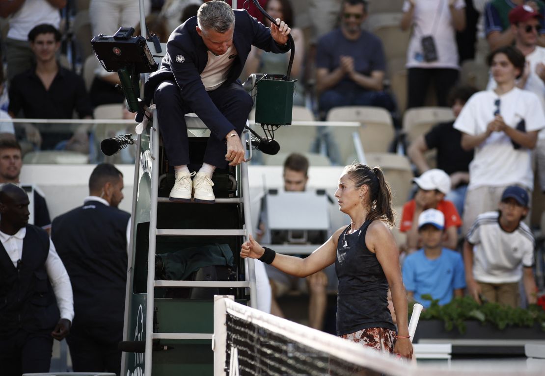 Daria Kasatkina gestures at the net after losing against Svitolina.