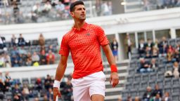 Holger Rune defeats Novak Djokovic in a wet quarterfinal match at the Italian Open.