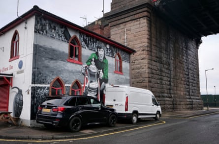 A mural of the 1973 FA Cup-winning goalkeeper Jim Montgomery on a pub beneath the Queen Alexandra Bridge in Sunderland