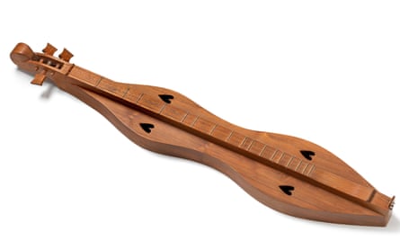 A traditional wooden Appalachian mountain dulcimer.