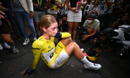 Demi Vollering celebrates at the finish line as the overall winner of the 2nd Tour de France Femmes in Pau.