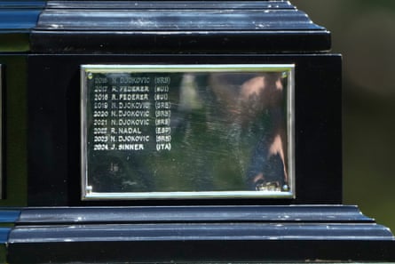 The engraved name of Jannik Sinner is seen on the Norman Brookes Challenge Cup.