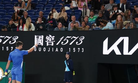 Novak Djokovic confronts a heckler at the Australian Open before narrowly avoiding a potential upset by Alexei Popyrin.