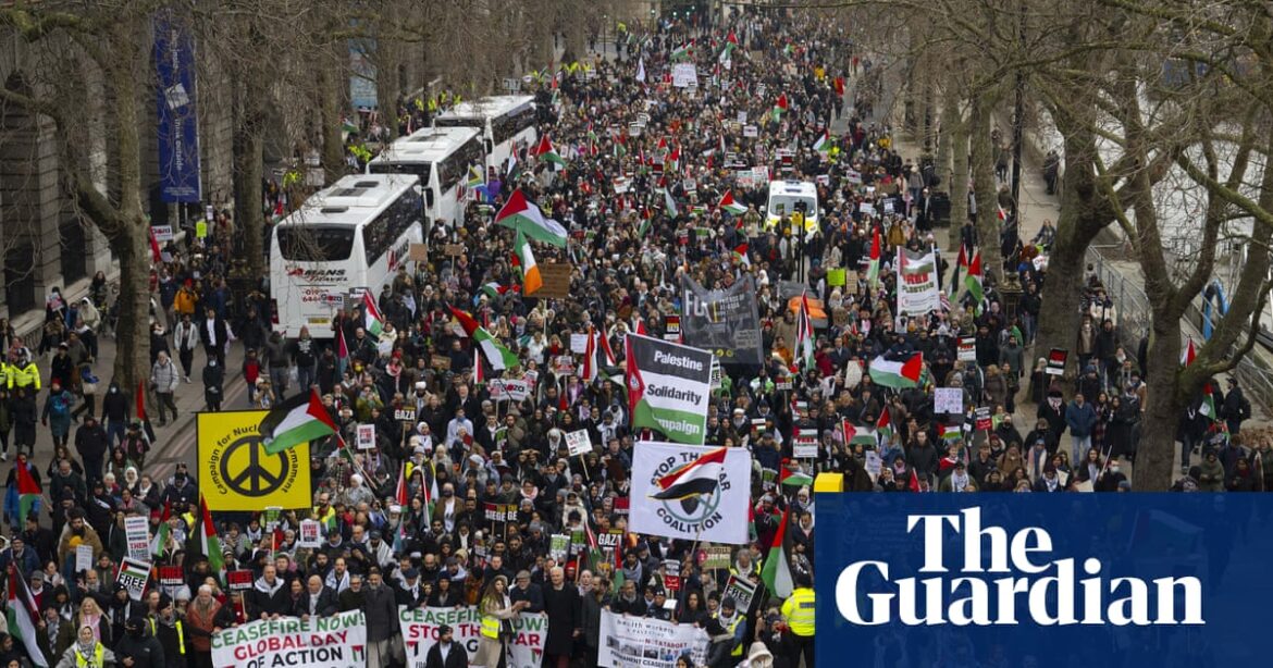 Numerous demonstrators supporting Palestine participate in a march in London.