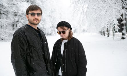 Sasha Piankov and his wife Masha, AKA Gnoomes, against a snowy backdrop