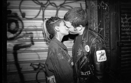 Punks kissing outside a graffiti-ridden shutter of ABC No Rio on Ridge Street, early 90s.