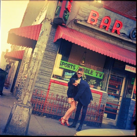 Ashley and Ron hugging outside the Parkside Lounge on East Houston, 1996
