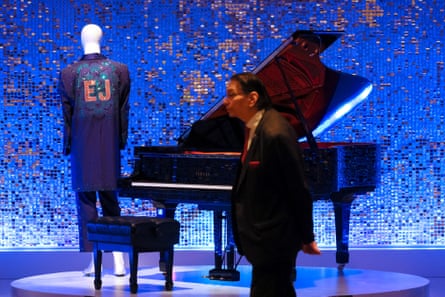 Elton John’s Yamaha grand piano and a costume.