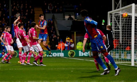 Scott Dann (centre left) scores for Crystal Palace against Bournemouth in 2015-16