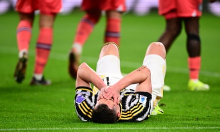 Juventus striker Arkadiusz Milik reacts after missing an opportunity to equalise