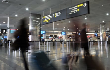 Airline passengers make their way through Melbourne Airport in Melbourne