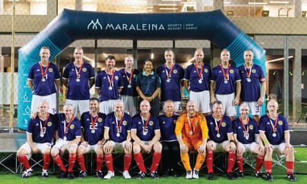 The Scotland over-50s team with their medals.