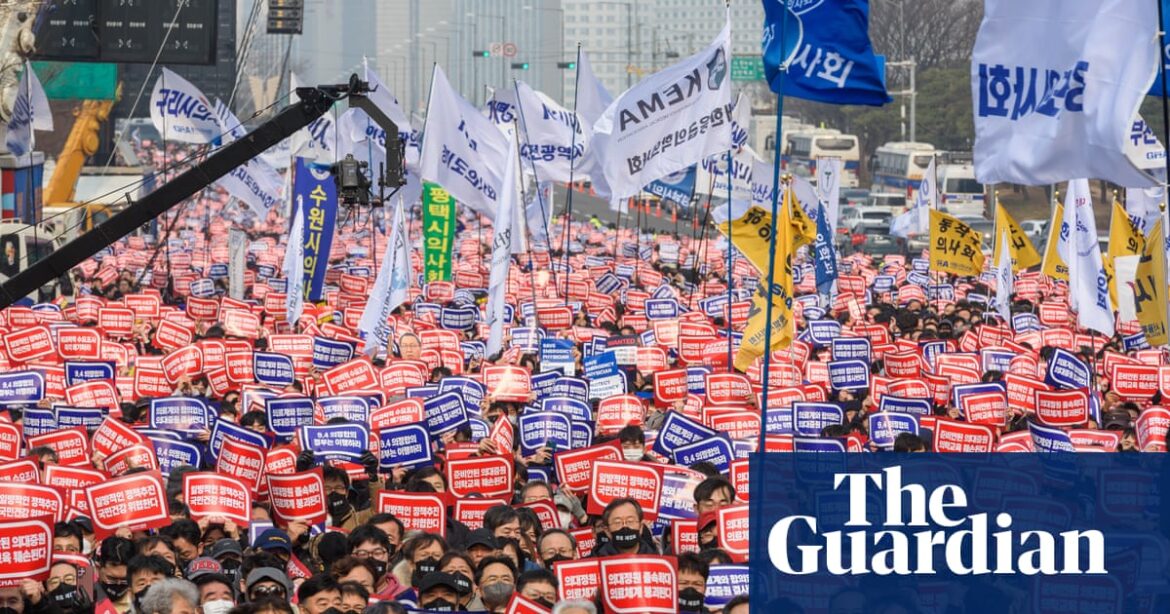 Thousands of medical licenses in South Korea may be suspended as the government responds to a strike by doctors.