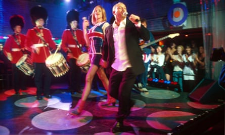 Allen, right, performing Vindaloo on The Pepsi Chart Show in 1998 with Dennis Pennis, left.