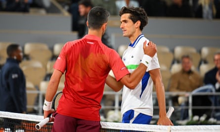 Djokovic overcomes form struggles and crowd in first round win at French Open