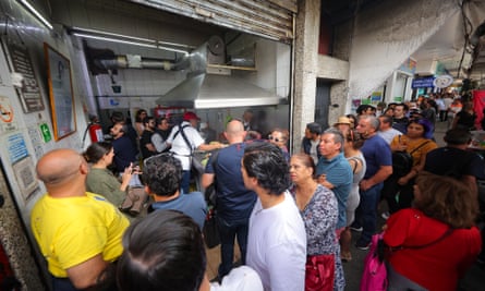 Queue of people outside takeaway