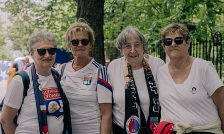 Lyon fans and former professional footballers Fabienne (left), Jocelyne (second right) and Michelle (right) with Lyon fan Danielle.