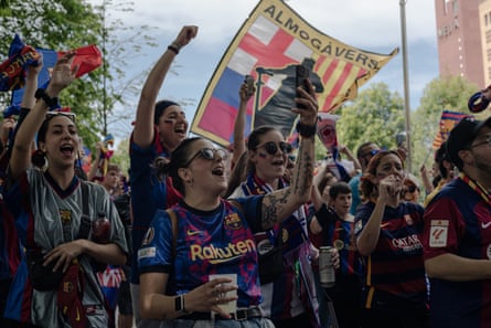 Barcelona fans enjoy the atmosphere at the fan zone in Bilbao.