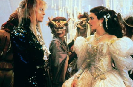 A film still of Jennifer Connelly with David Bowie in Labyrinth.