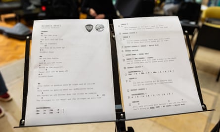 Page on a music stand displaying chords and lyrics for Brummie Steel