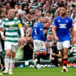 Matt O’Riley helps Celtic see off 10-man Rangers to all but secure Scottish title
