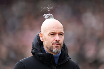 Erik ten Hag with bubbles over his head prior to the Premier League match between West Ham and Manchester United at the London Stadium