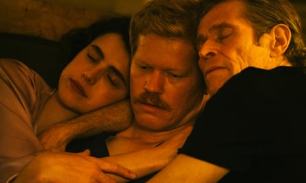 Margaret Qualley, Jesse Plemons (who looks uneasy) and Willem Dafoe cuddle up in Kinds Of Kindness.