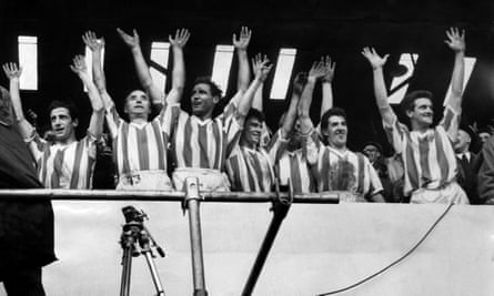 Stoke City players celebrate after beating Luton to gain automatic promotion to Division One in 1963.