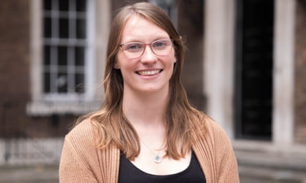 Rebecca Redfern smiles as she stands outside Admiralty House