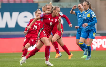 Kayleigh Barton celebrates after scoring Wales’ equaliser from the penalty spot.