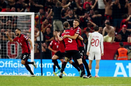 Wild celebrations after Jasir Asani opens the scoring in the qualifier against Poland in Tirana.