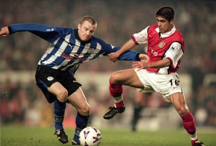 Sylvinho grapples with Sheffield Wednesday’s Alan Quinn at Highbury in 2000.