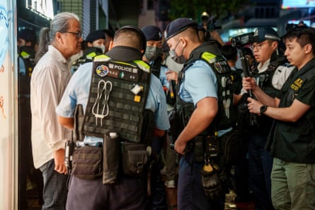 Tiananmen Square anniversary: Hong Kong police detain artist who made sign in the air