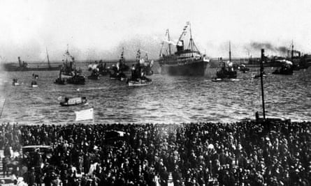 Huge crowds line the dockside to await the arrival of the victorious Uruguayan football team as their ship returns to Montevideo from France in 1924. The Uruguayan team beat the Switzerland team 3-0 to win the gold medal in the final of the football tournament at the 1924 Summer Olympics.