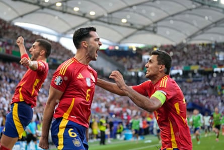 Mikel Merino (left) celebrates with Álvaro Morata after heading home Spain’s winner in their quarter-final against Germany.