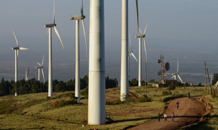 Wind turbines on a hill.