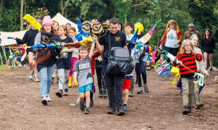 Cumbria, my lord, Cumbriaaaa … children parade an owl puppet through Krankenhaus.