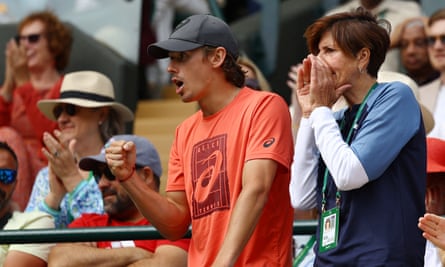 De Minaur cheers on girlfriend Katie Boulter from the stands in her match against Harriet Dart.