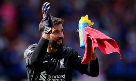 Alisson acknowledges the Liverpool fans after the 2-0 victory at Ipswich