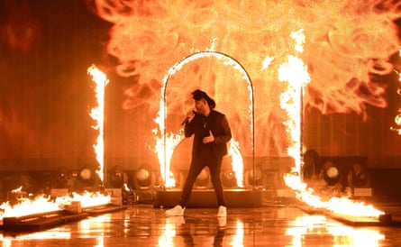 The Weeknd on stage during the 2015 American Music Awards in Los Angeles.