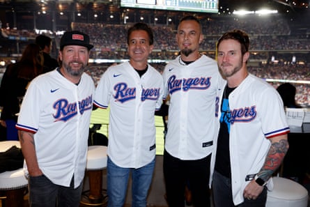 Scott Phillips, Stapp, Mark Tremonti and Brian Marshall of Creed during a baseball game between the Houston Astros and the Texas Rangers in Arlington, Texas, 2023.