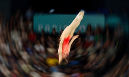 A competitor in action during the qualifying rounds of the women’s trampoline gymnastics