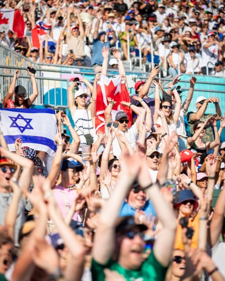 Fans perform a Mexican Wave during Canada’s Brandie Wilkerson and Melissa Humana-Paredes two straight sets win over the US’ Kristen Nuss and Taryn Kloth.