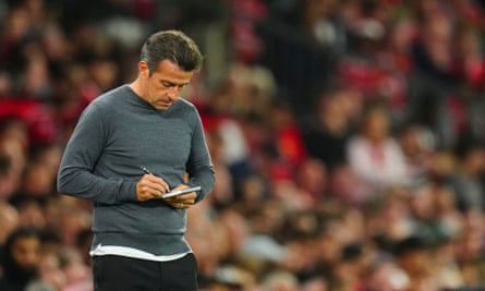 Marco Silva scribbles, agitated, in his notebook