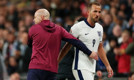 Carsley congratulates Harry Kane on his two-goal haul against Finland as the England striker leaves the field